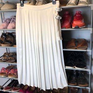 White Pleated Midi skit with short underneath